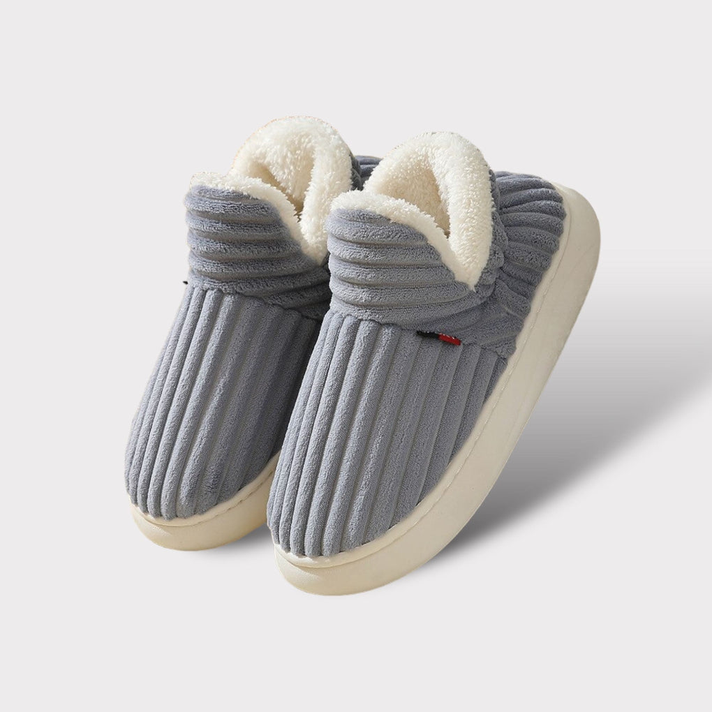Cozy ergonomic indoor slippers. Ultra-warm plush footwear, anti-slip sole for ultimate comfort & relaxation.
