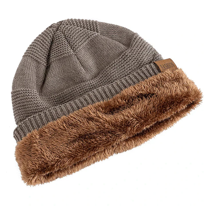 Acrylic knit beanie hat, fleece-lined for ultimate warmth. Essential cold weather headwear.