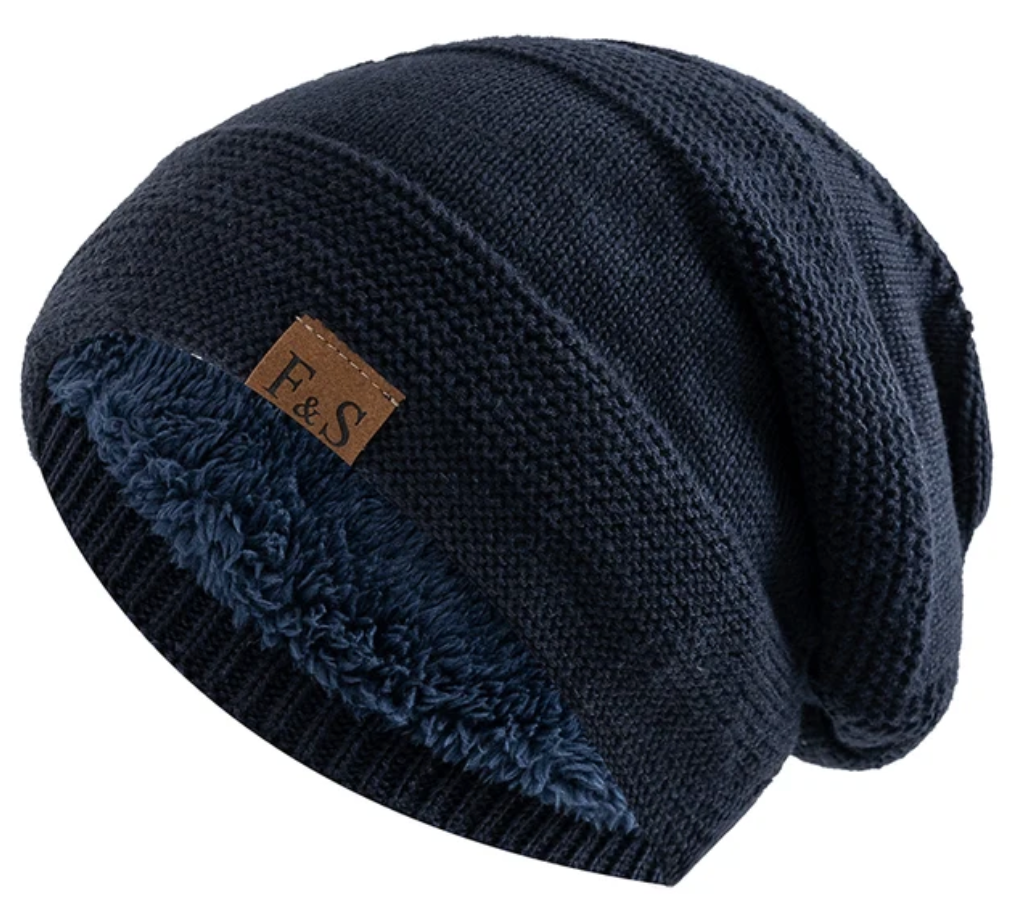 Black fleece-lined winter beanie hat. Warm acrylic headwear, perfect for any cold weather outfit.