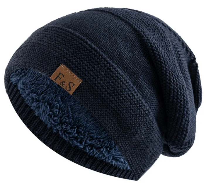 Black fleece-lined winter beanie hat. Warm acrylic headwear, perfect for any cold weather outfit.