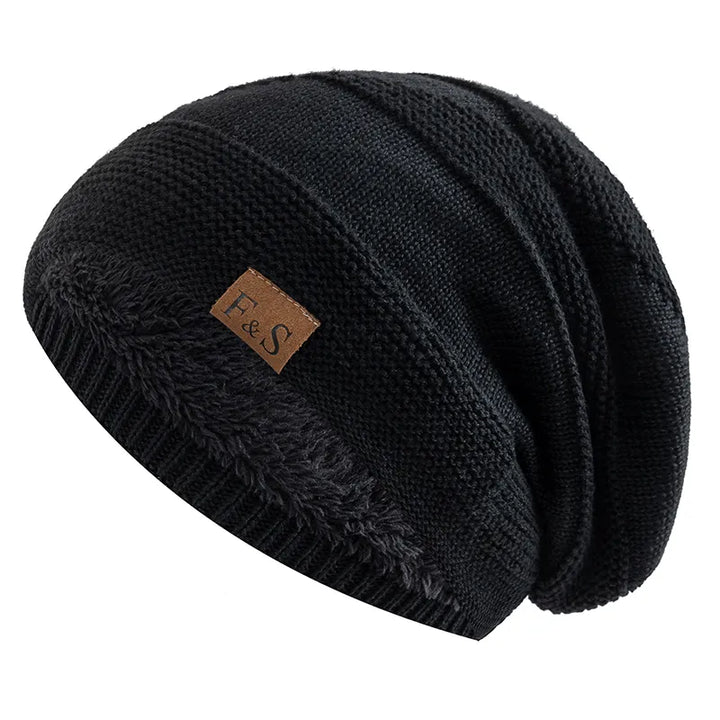 Grey unisex winter beanie hat with soft fleece lining, providing warmth and style for cold days.