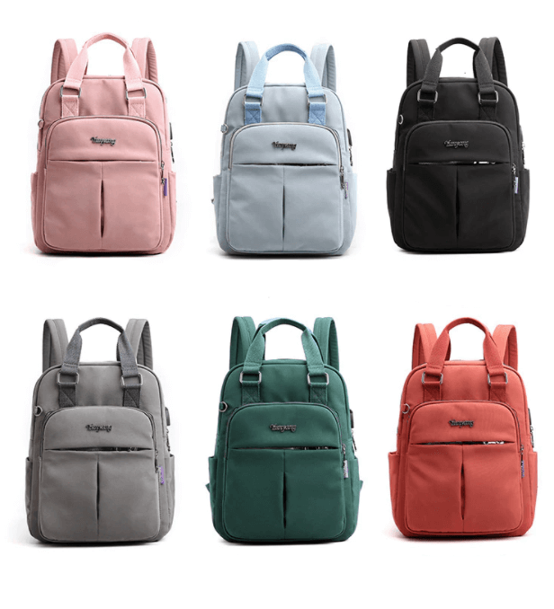Detail of the integrated USB charging port on a water-resistant, anti-theft backpack. Convenient for travel.