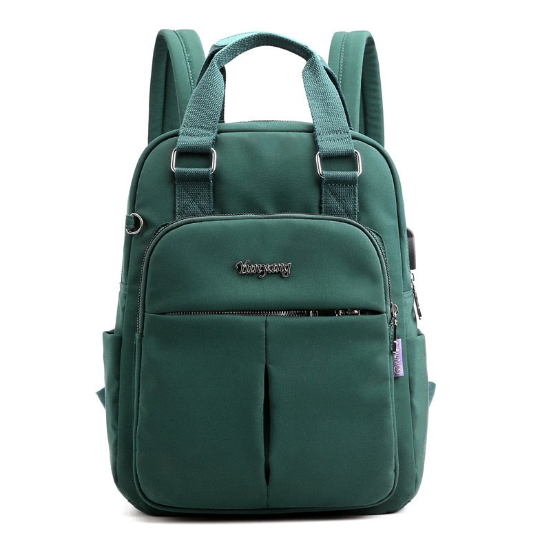 Close-up of secure anti-theft zippers on a durable, water-resistant USB charging multi-compartment backpack.