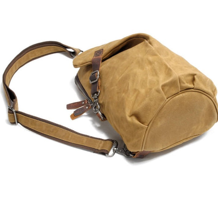 Versatile multiwear shoulder bag. Water-resistant canvas & anti-theft design for daily travel & essentials.