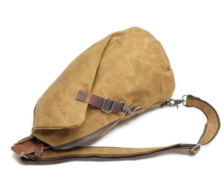 Slim & compact unisex canvas daily bag, perfect for everyday essentials with a hidden anti-theft pocket.