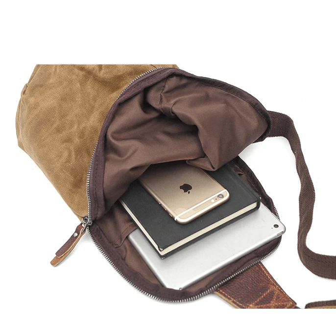 Organized interior of the compact canvas crossbody bag, ready for daily essentials & travel items.