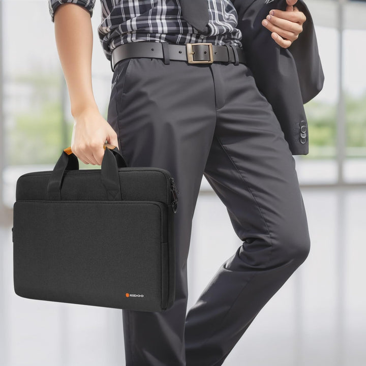 Organized water-resistant laptop bag, shoulder carry, padded for daily tech essentials.