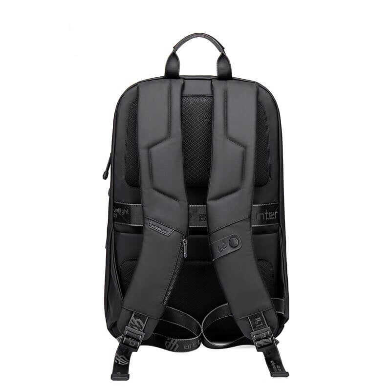Close-up of durable water-resistant nylon fabric on a multi-compartment backpack, built for outdoor and travel use.
