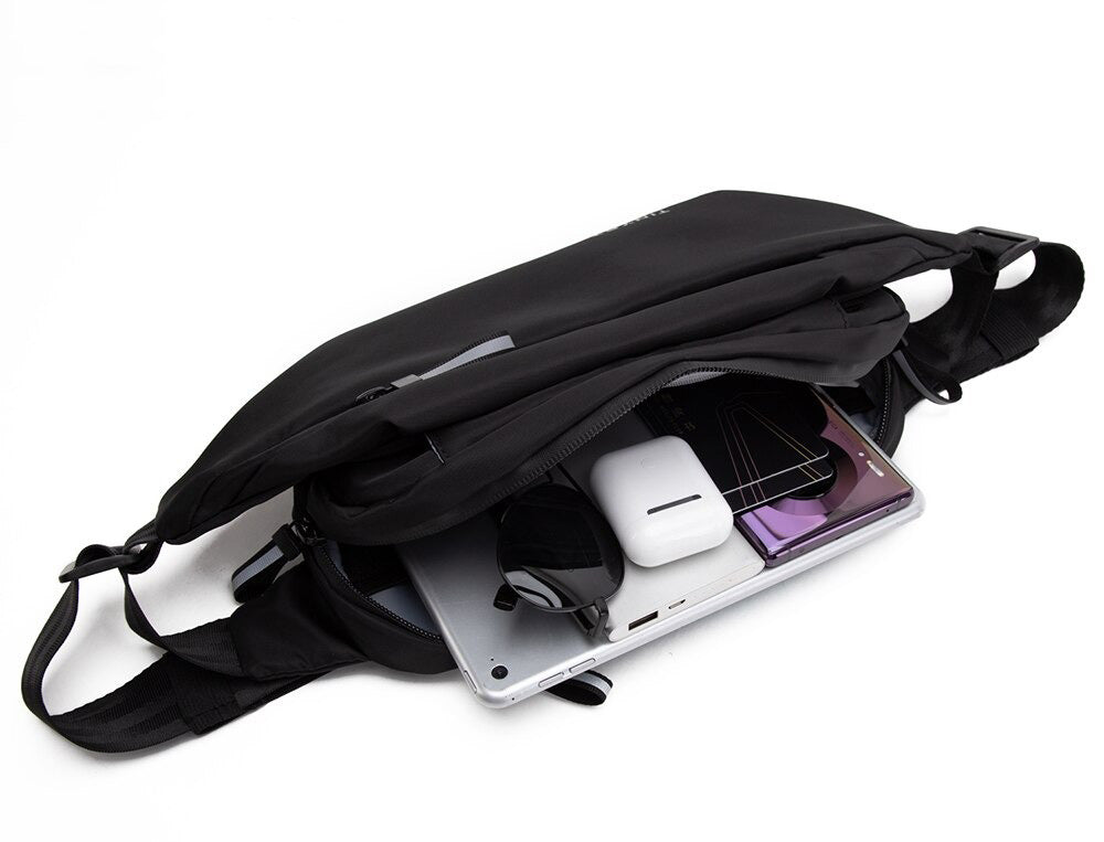 Unisex water-resistant multi-pocket fanny pack for hands-free travel, hiking, and sports activities.
