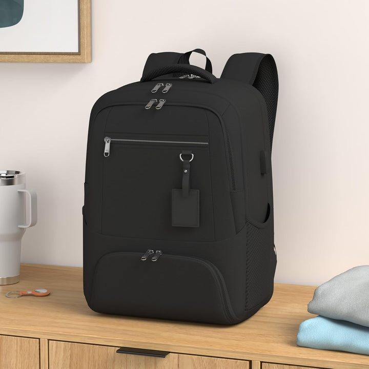 Spacious unisex laptop backpack, waterproof, with USB port & separate insulated lunch compartment.