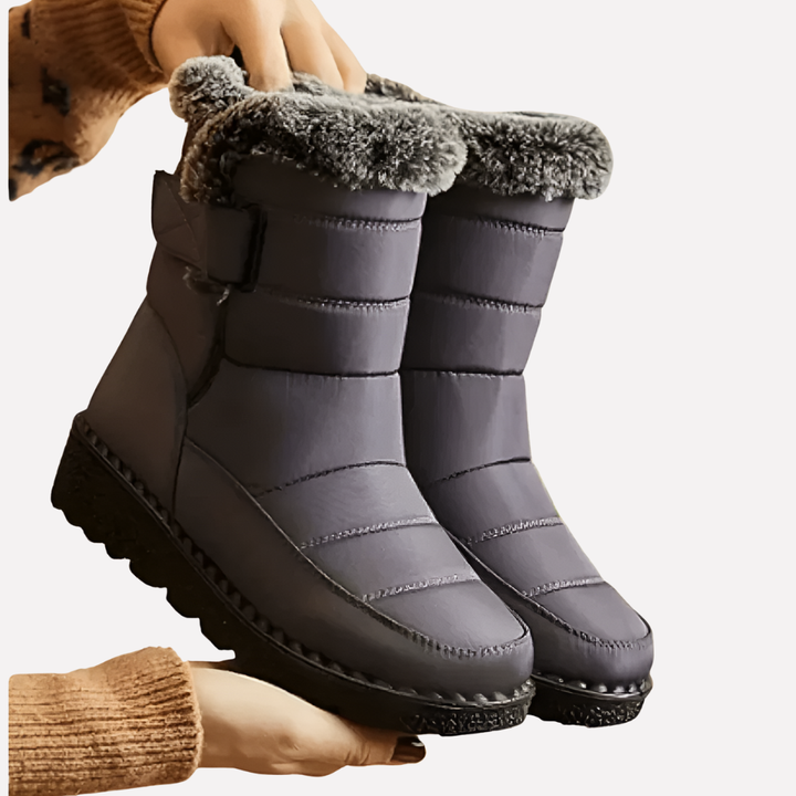 Durable unisex insulated snow boots, waterproof & non-slip for ultimate warmth & grip in extreme cold conditions.