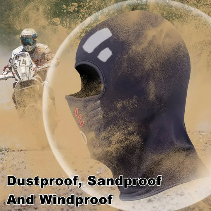 Cyclist wearing a windproof thermal balaclava face mask for cold weather protection during rides.