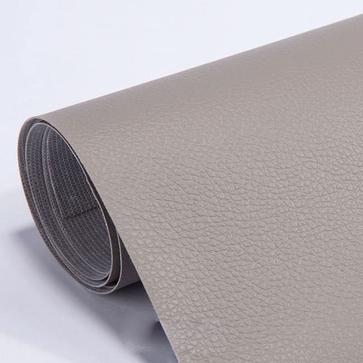 Universal self-adhesive patch, 20x54 inch, for easy repair of seats, sofas, & other upholstery.
