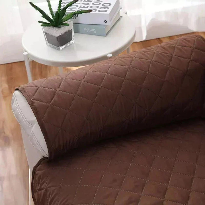 Solid grey stretch armchair slipcover for a fresh and modern living room look.