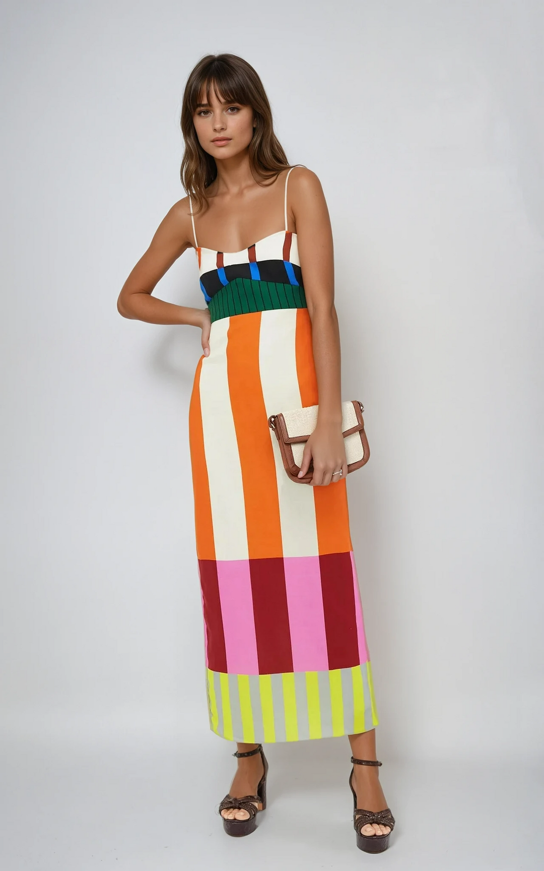 Vibrant color-blocked women's maxi dress with bold stripes, perfect for summer casual wear & beach vacations.