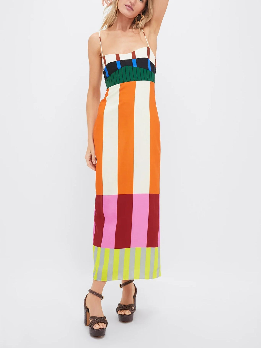 Stylish women's vibrant striped color-blocked maxi dress, ideal as a flowy sleeveless summer statement piece.