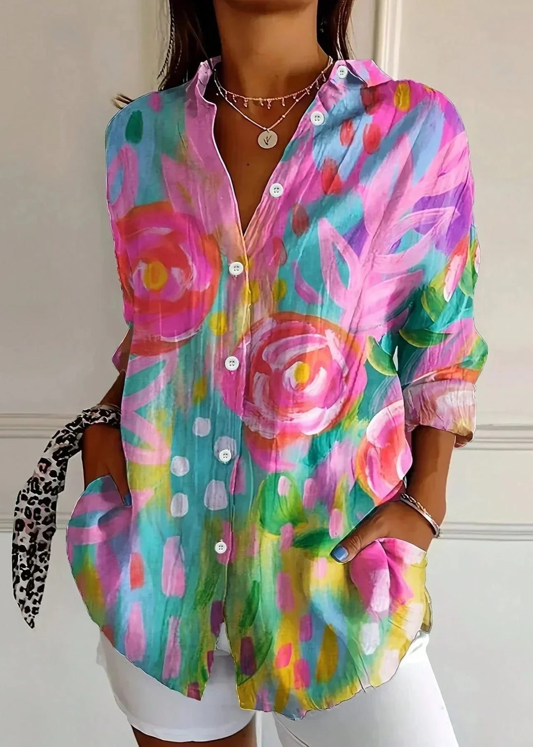 Vibrant printed long sleeve blouse for women. Stylish, effortless casual fashion top.