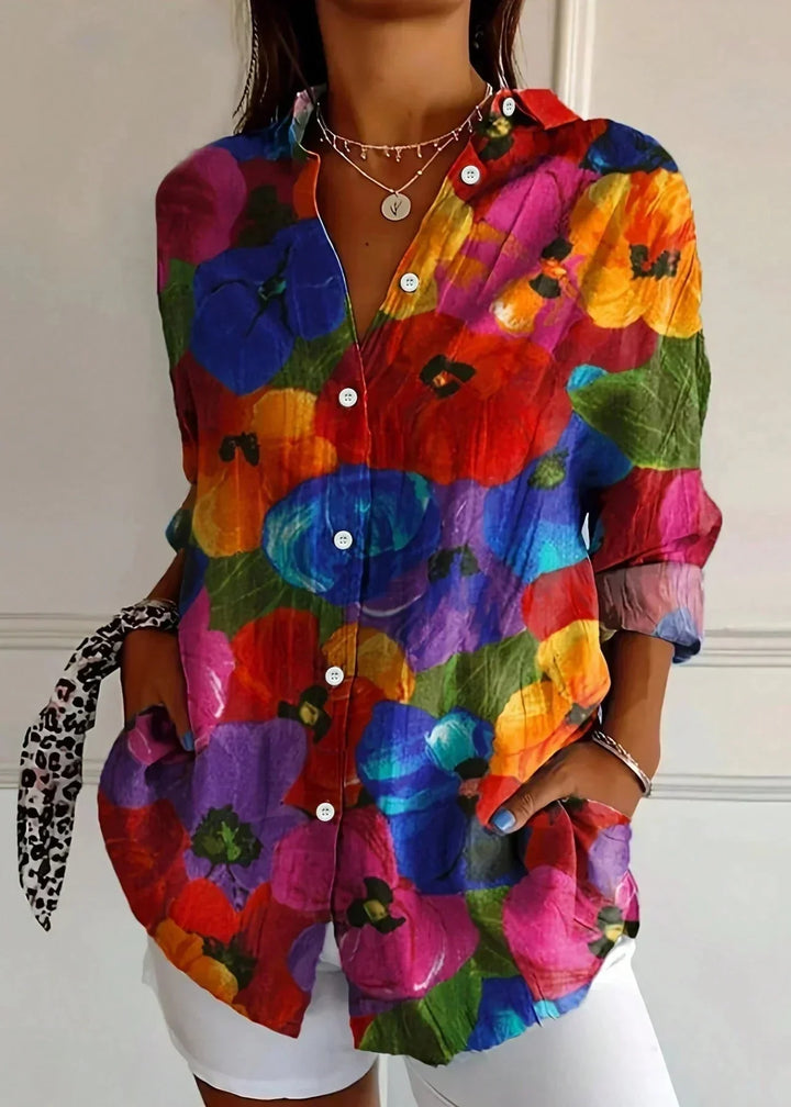 Versatile women's vibrant printed long sleeve top, perfect for a casual yet elegant fashion statement.