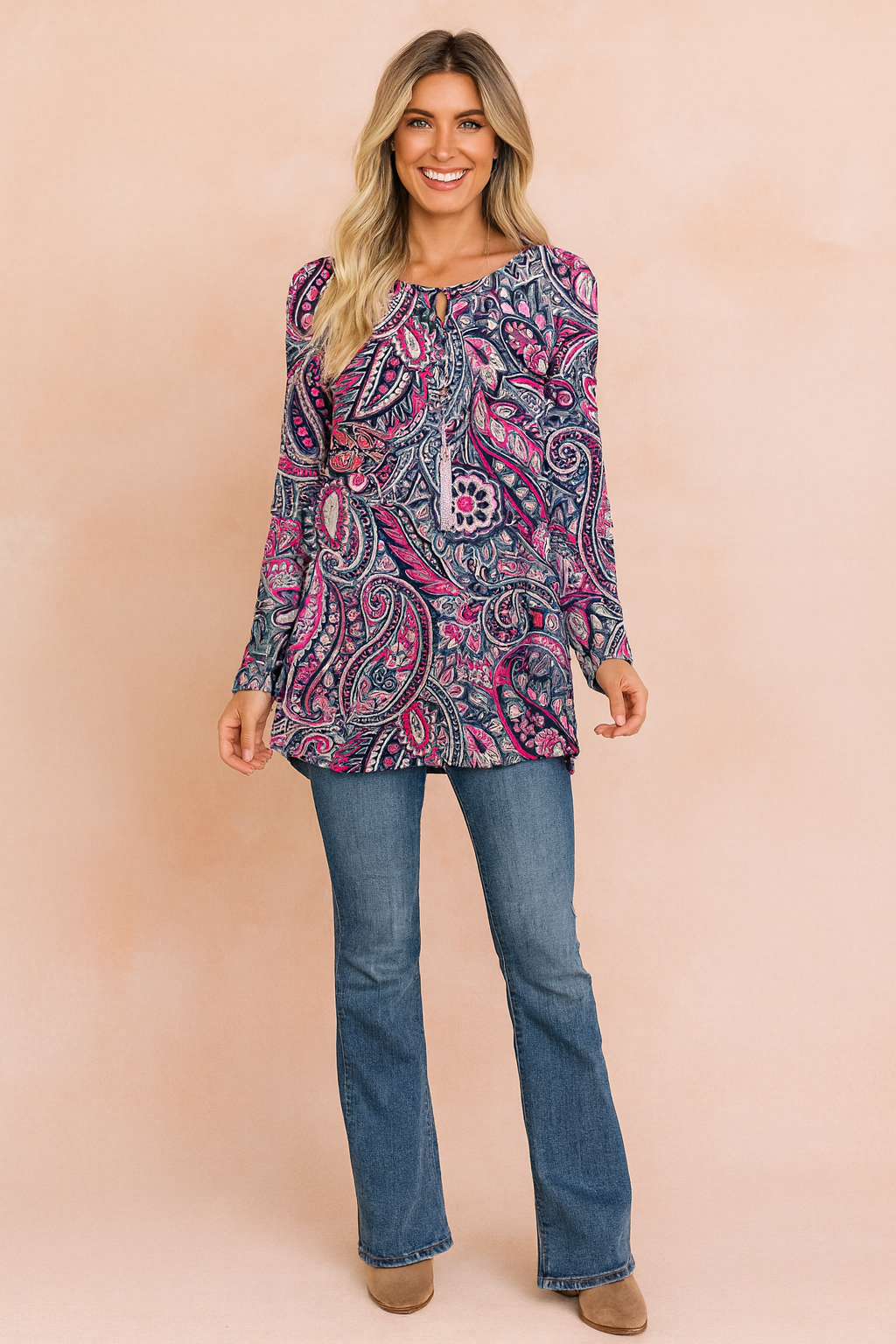 Unique vibrant paisley print women's sweater with an oversized fit, a fashionable long sleeve top for comfort.