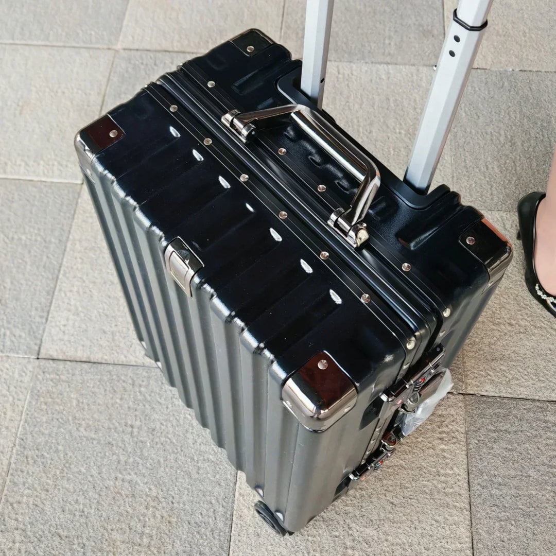 Smooth-rolling Vilnius hardside luggage with 360° spinner wheels & durable aluminum frame for easy airport navigation.