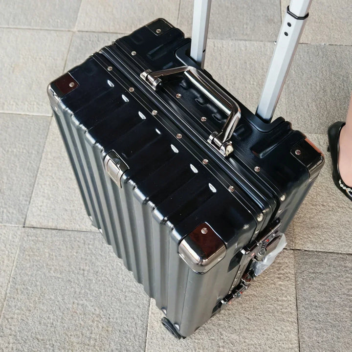 Smooth-rolling Vilnius hardside luggage with 360° spinner wheels & durable aluminum frame for easy airport navigation.