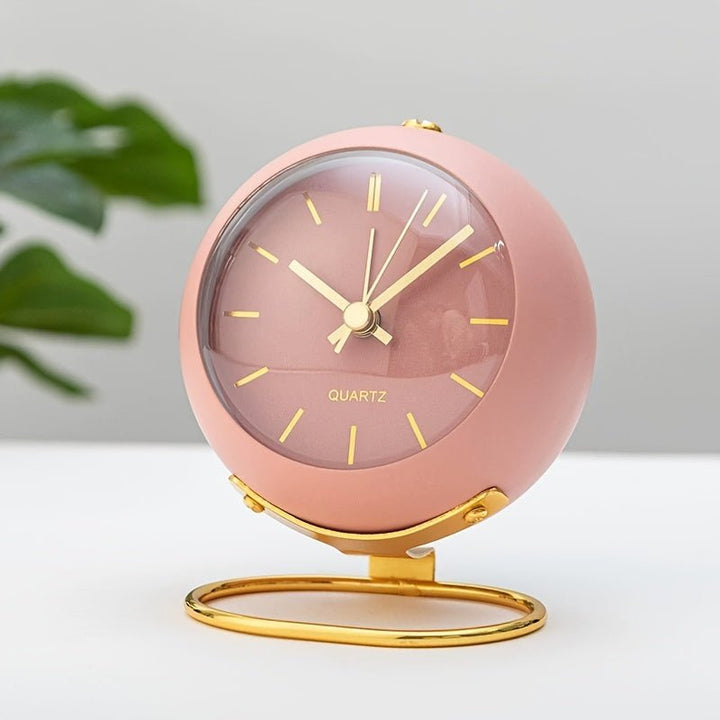 Classic vintage analog alarm clock for bedroom & office desk, adding retro style to home decor.