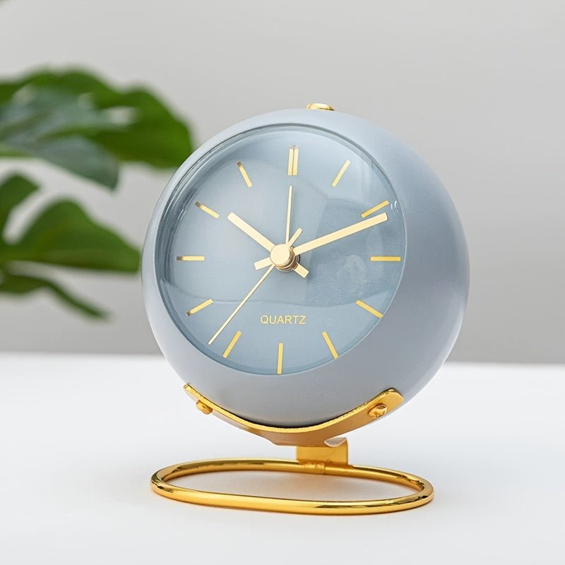 Traditional vintage analog clock with a loud classic alarm, ideal for nightstand or desk decor.