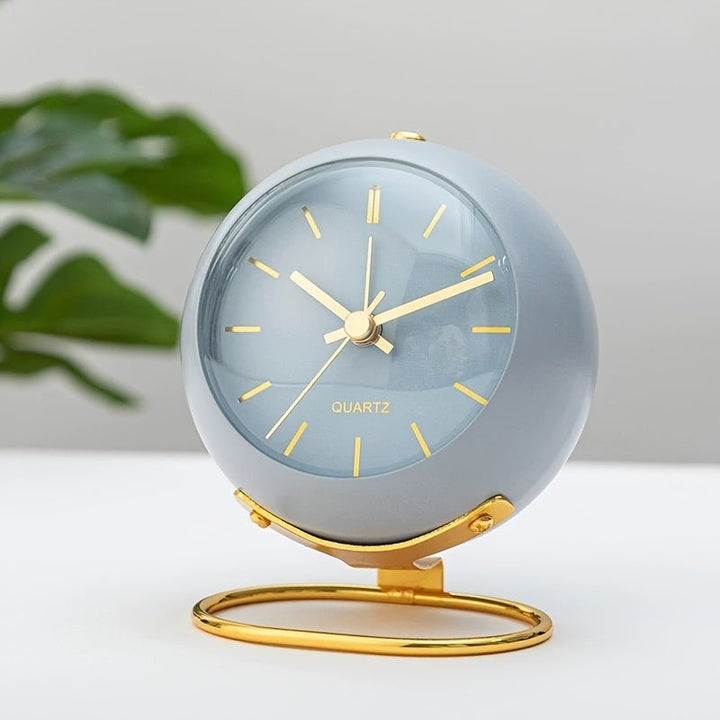 Traditional vintage analog clock with a loud classic alarm, ideal for nightstand or desk decor.
