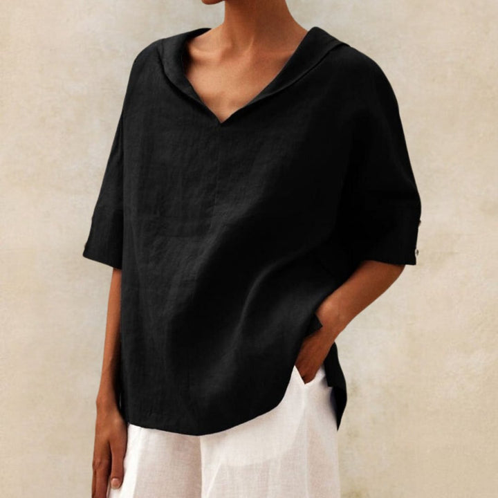 "Visual of a Women's V-Neck Linen Blouse, relaxed fit, elbow sleeves, breathable fabric, ideal for elegant, casual occasions.
