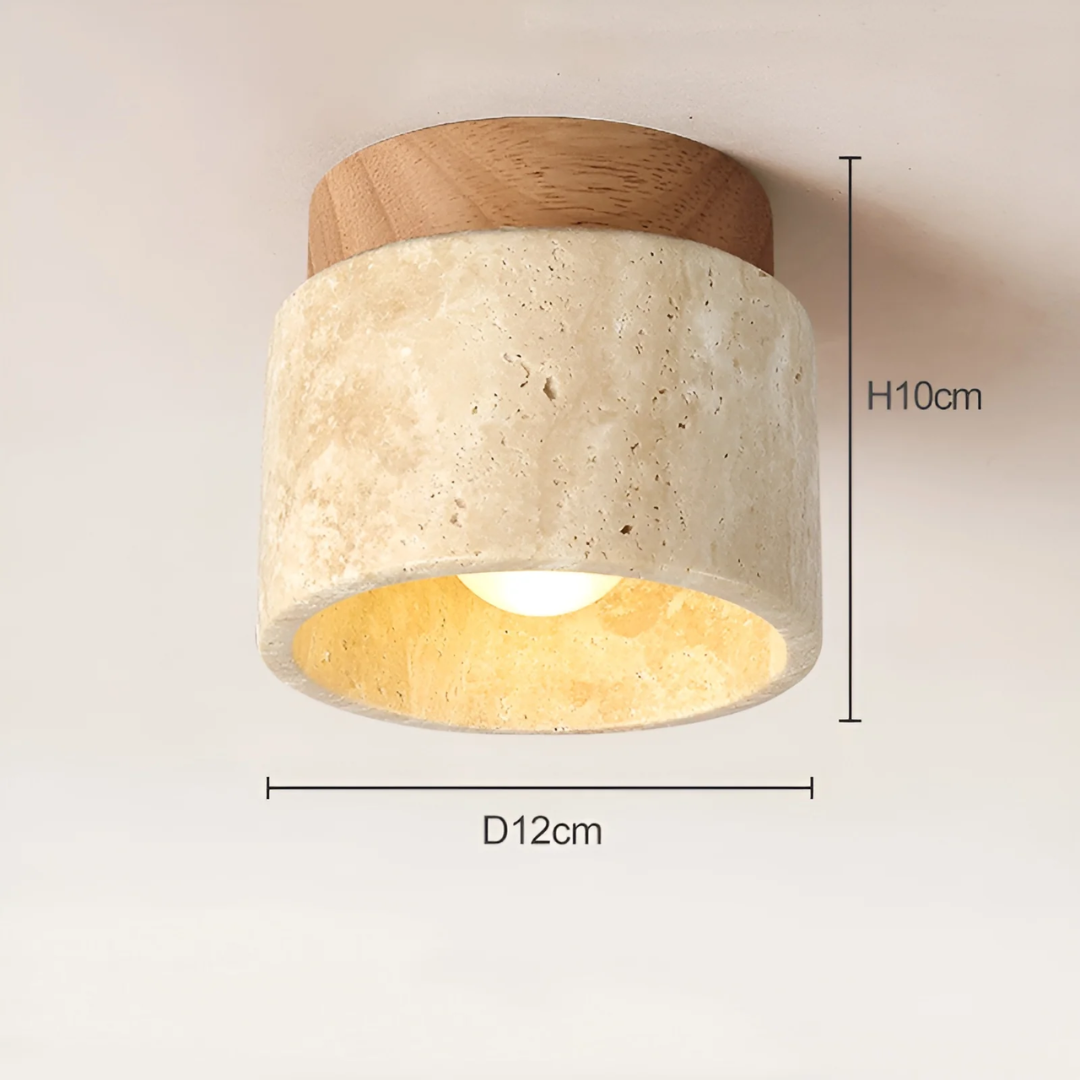 TranquilStone Wabi Sabi travertine ceiling lamp providing soft ambient light for a peaceful, zen-inspired interior.