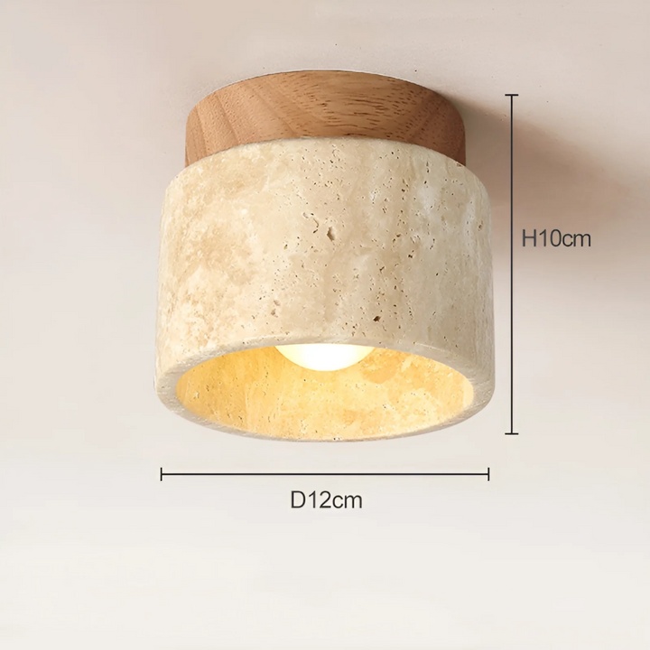 TranquilStone Wabi Sabi travertine ceiling lamp providing soft ambient light for a peaceful, zen-inspired interior.