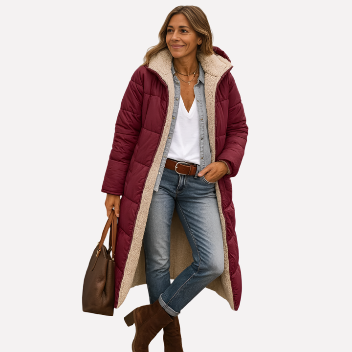 Fashionable women's long quilted coat, structured and versatile for fall & winter. Cozy hooded outerwear.