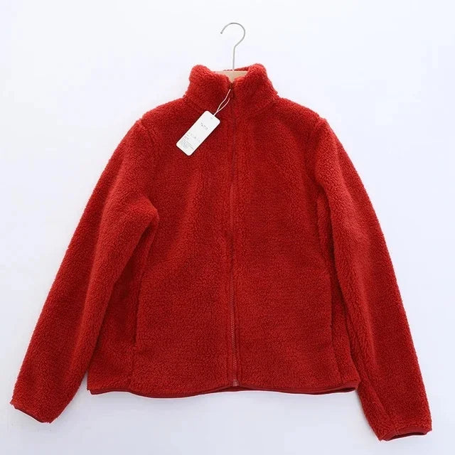 Relaxed fit women's cozy jacket, warm winter outerwear with zipper, ideal for comfortable casual use.