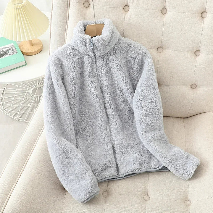 Women's warm winter jacket, ideal cozy outerwear for cold temperatures. Comfortable for casual layering.