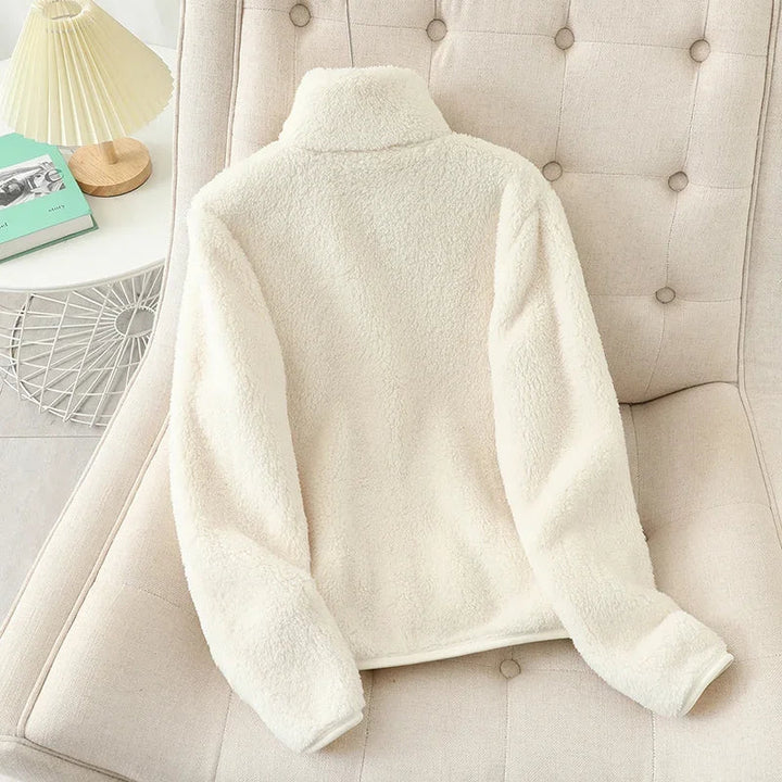 Warm women's cozy winter jacket, perfect for casual comfort and layering on cold days.