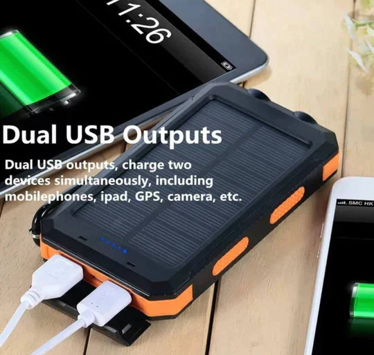 Waterproof 500000mAh solar power bank with dual USB ports, rugged design, ideal for outdoor use and charging devices on the g