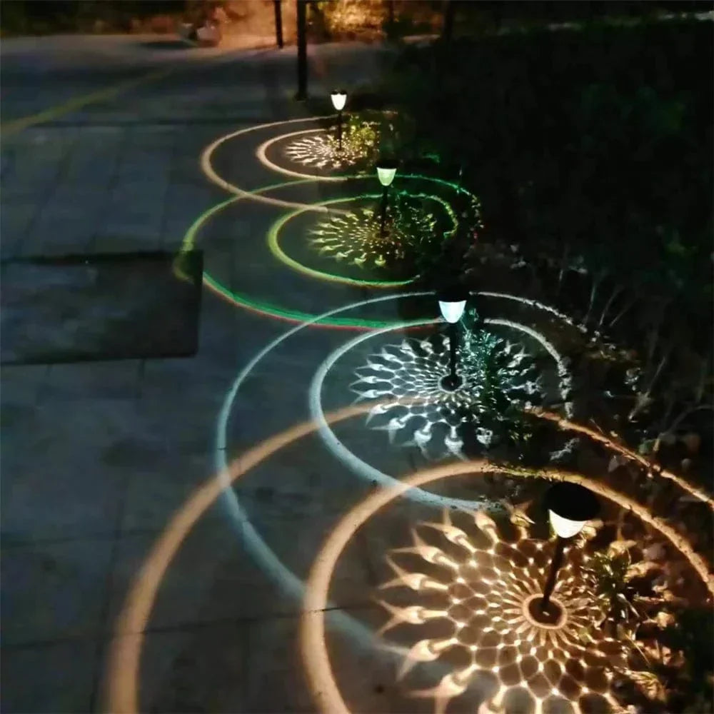 Weatherproof garden light casting intricate mandala shadows, solar-powered, LED, IP65 waterproof, enhances outdoor decor.