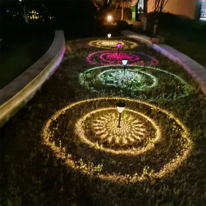 Weatherproof garden light casting intricate mandala shadows, solar-powered, LED, IP65 waterproof, enhances outdoor decor.