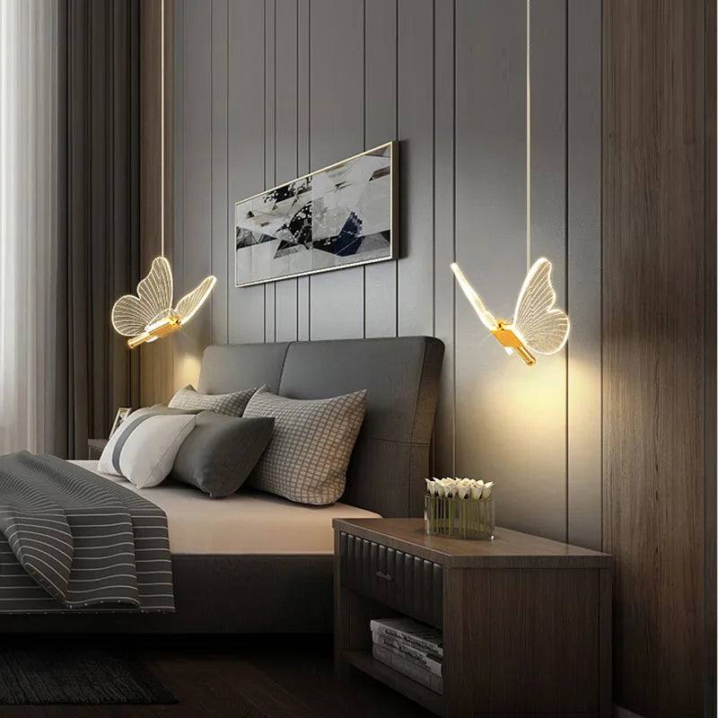 Close-up of a magical LED butterfly pendant lamp, showcasing intricate design & soft glow for nursery decor.