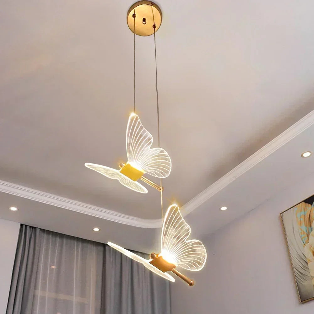 Decorative LED butterfly pendant lamp perfect for nursery lighting, adding a gentle glow & charming decor.