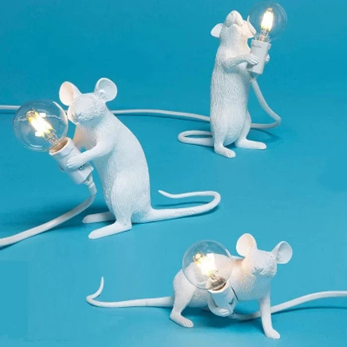Golden SqueakLight mouse lamp. Modern decorative resin accent light for unique home decor.