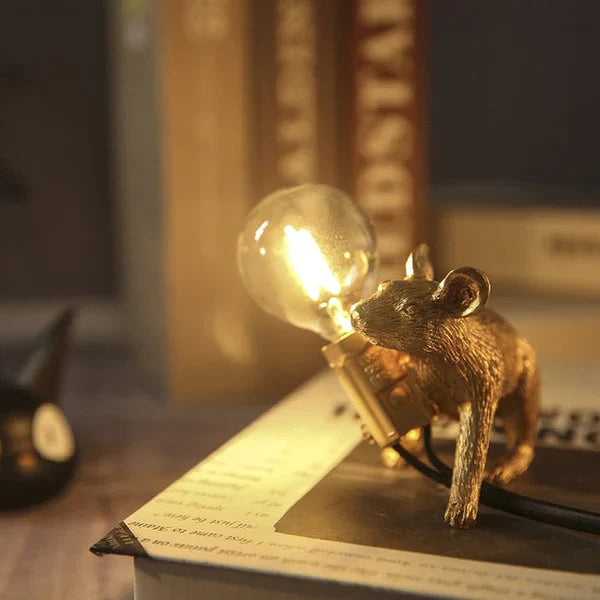 Overhead view of SqueakLight mouse lamp. Whimsical resin animal table light, unique home accent.
