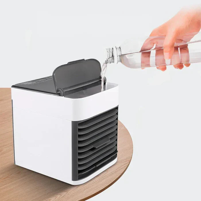 Portable mini air conditioner, humidifier & purifier with LED light for quiet home or office cooling.