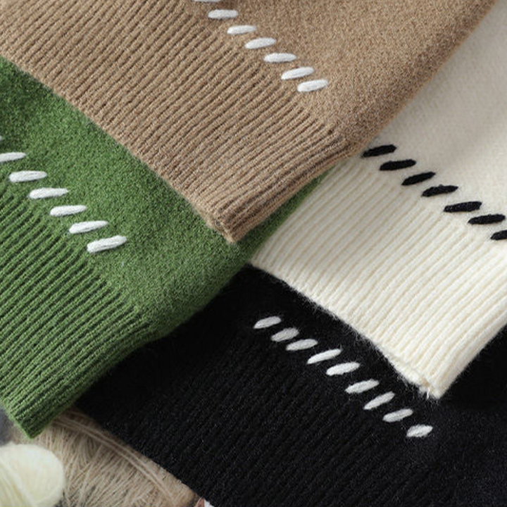 "White men's wool cardigan sweater with button-up front, ribbed cuffs, and black stitch detail for stylish winter wear."