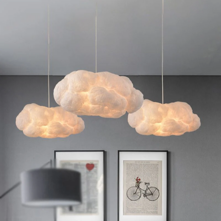 White modern cloud LED pendant light, PVC/cotton. Ideal for living room or bedroom decor.