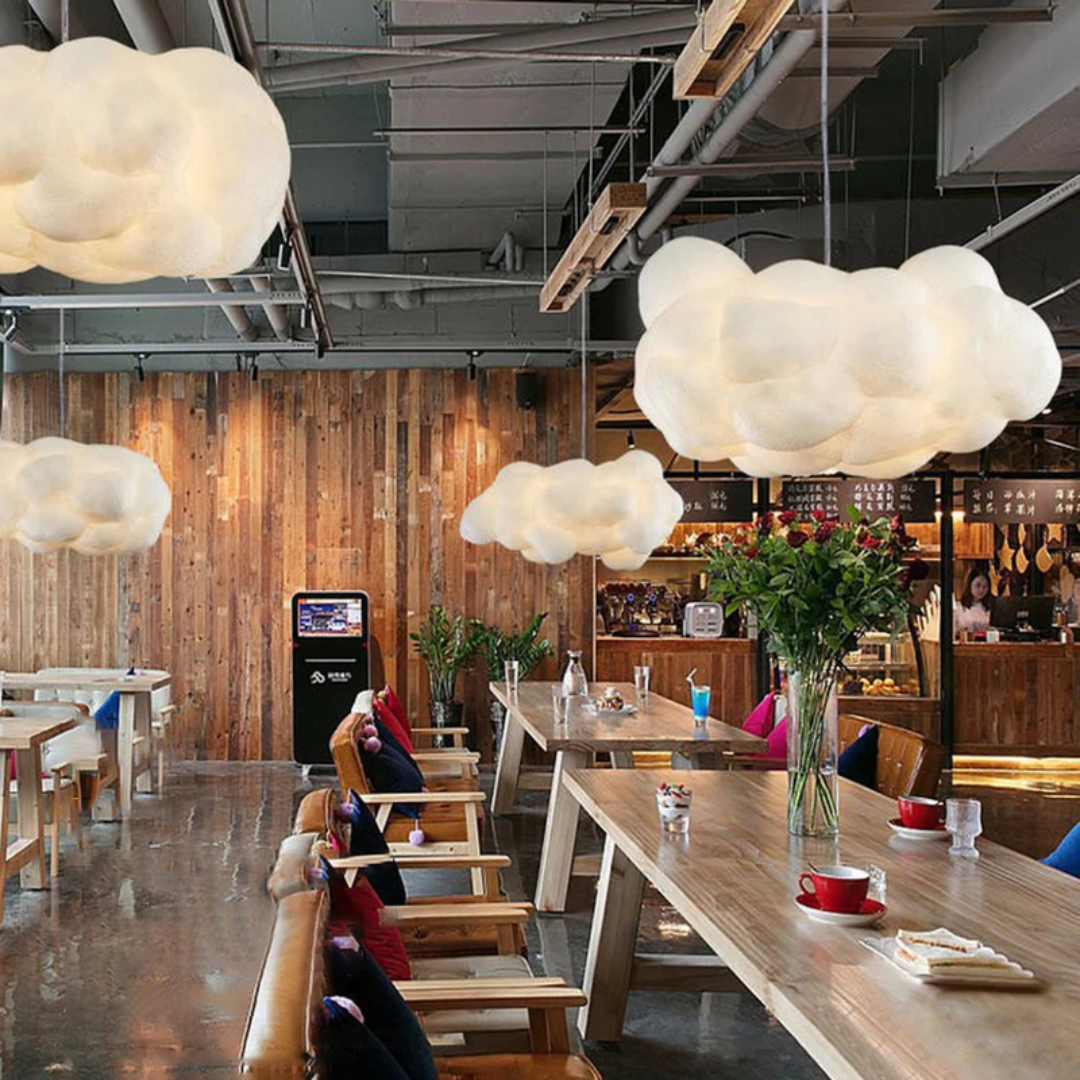 White cloud LED pendant light. Modern PVC/cotton design, ideal for a contemporary living room.