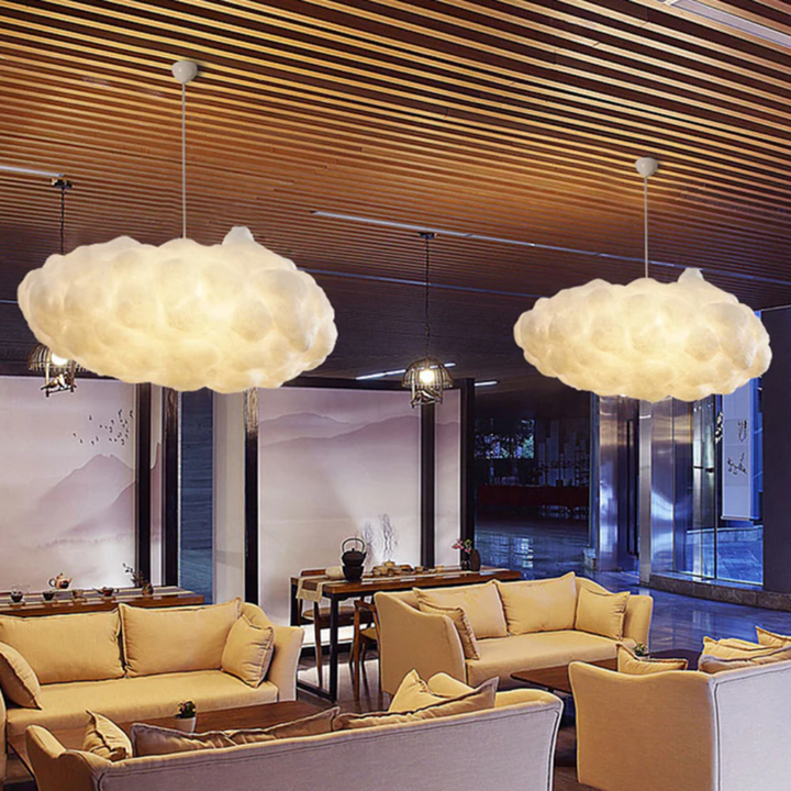 Distinctive white cloud LED pendant light with a modern PVC/cotton finish. Enhances any space.