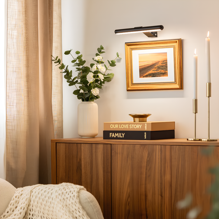 Wireless dimmable LED accent light illuminates art displays. Rechargeable, easy install for home decor.