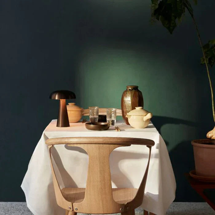 Modern mushroom-shaped portable table lamp with dimmable LED, ideal for stylish home decor.