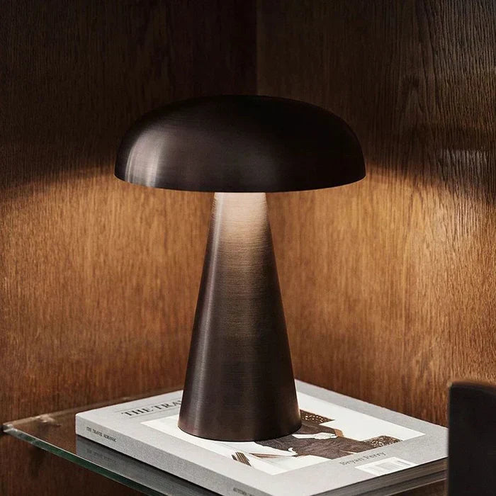 Contemporary mushroom desk lamp, portable & dimmable LED, enhances modern home and office decor.